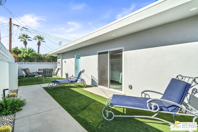 exterior space with a yard and a patio