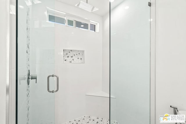 bathroom featuring walk in shower