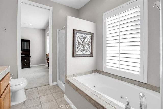 full bathroom featuring shower with separate bathtub, tile patterned flooring, vanity, and toilet