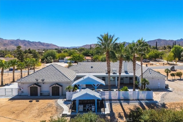 view of front of property with a mountain view