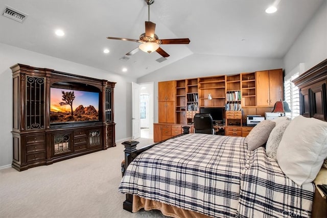 carpeted bedroom featuring vaulted ceiling and ceiling fan