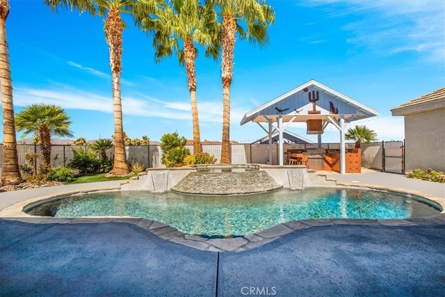 view of swimming pool featuring a patio and pool water feature