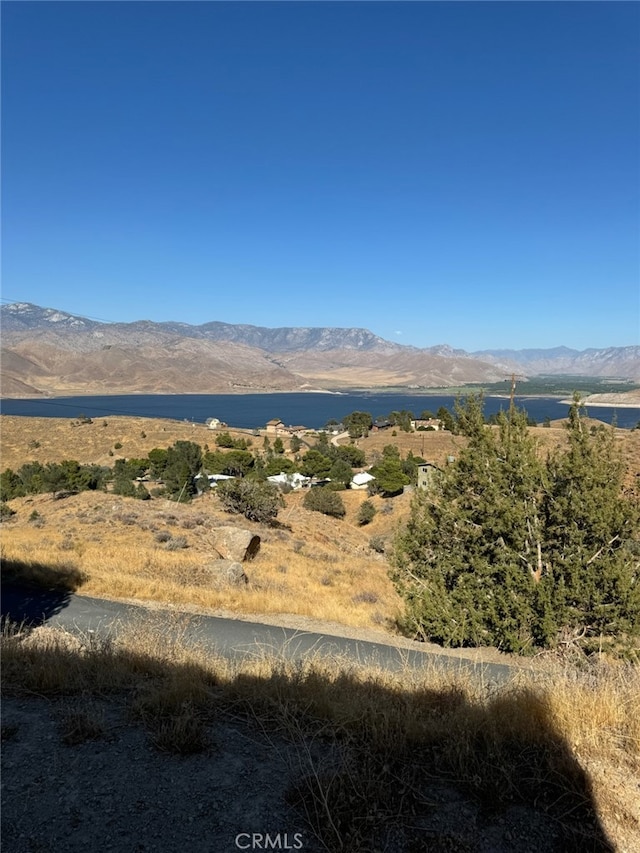 view of mountain feature featuring a water view