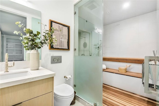 11 Seabreeze Ter, Dana Point, CA 92629 - full bathroom with a stall shower, toilet, and vanity