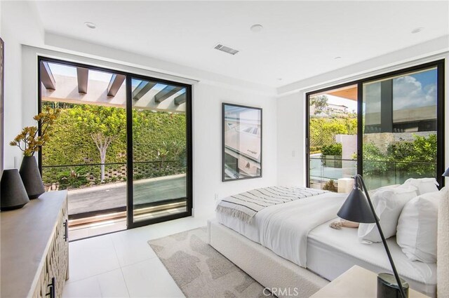 tiled bedroom with access to exterior