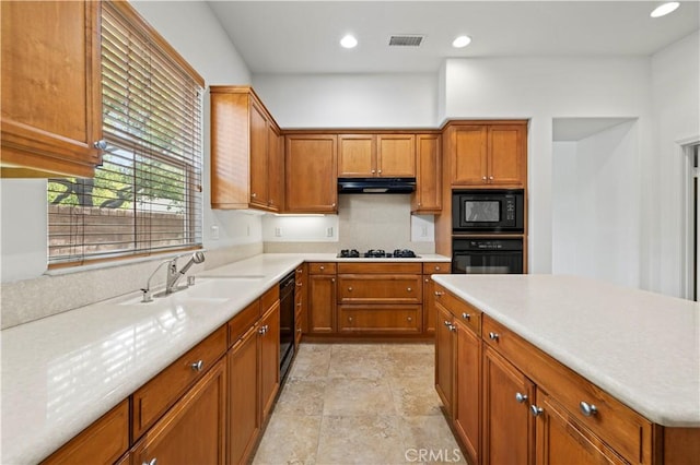 kitchen featuring sink and black appliances