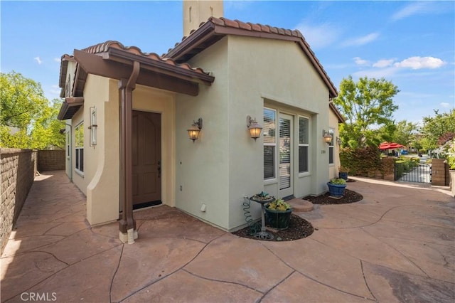 rear view of house featuring a patio