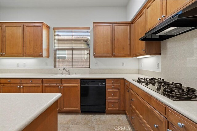 kitchen with dishwasher, sink, and gas cooktop