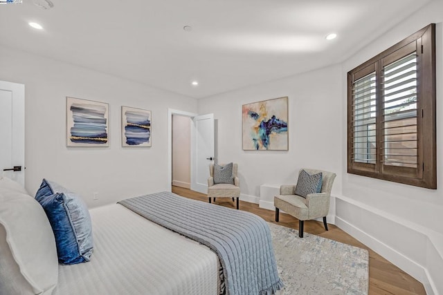 bedroom featuring hardwood / wood-style floors