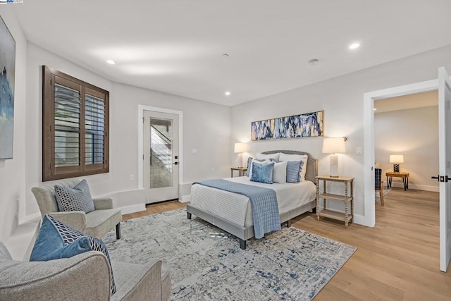 bedroom with light wood-type flooring