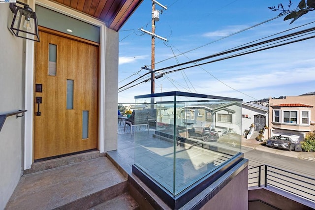 doorway to property featuring a balcony