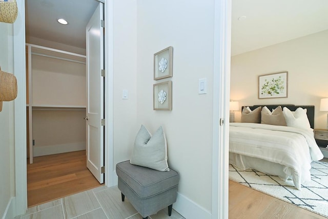 bedroom featuring a closet and light hardwood / wood-style floors