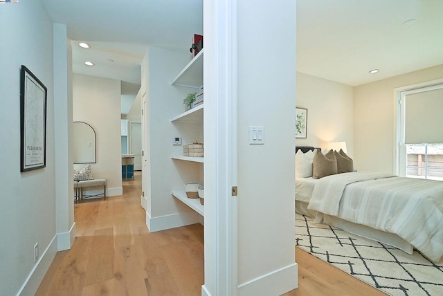 bedroom with light hardwood / wood-style floors