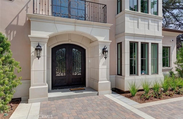 entrance to property featuring french doors