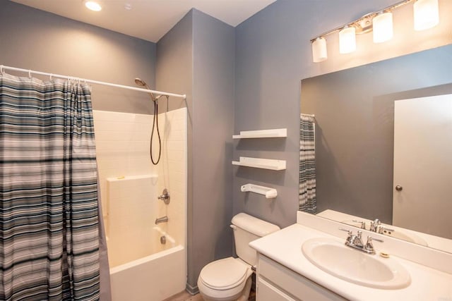 full bathroom with vanity, toilet, and shower / tub combo with curtain