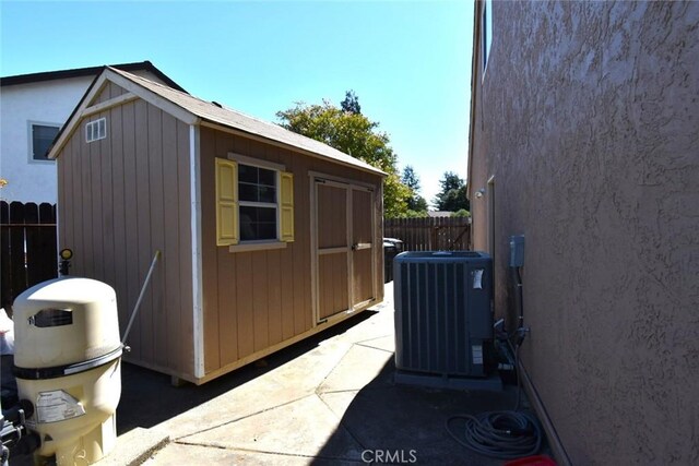 view of outbuilding featuring central AC