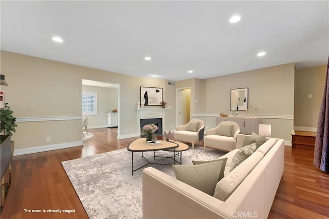 living room with dark wood-type flooring