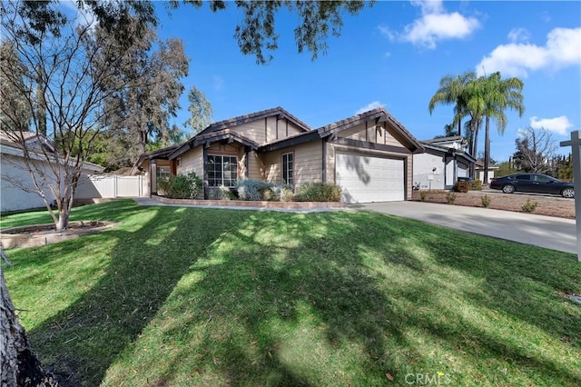 view of front of house featuring a garage and a front lawn