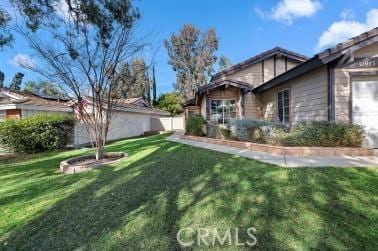 exterior space with a front lawn