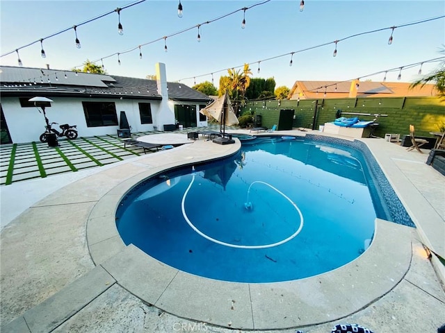 view of pool featuring a patio area