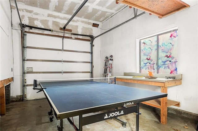 game room with concrete floors