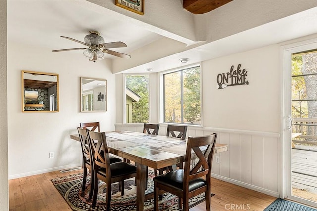 dining space featuring light hardwood / wood-style flooring, a wealth of natural light, and ceiling fan