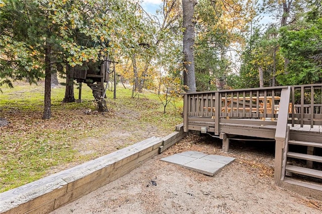 view of yard with a deck