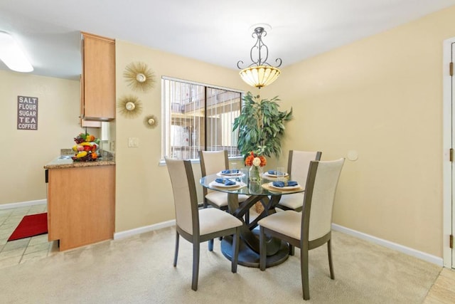 view of carpeted dining room