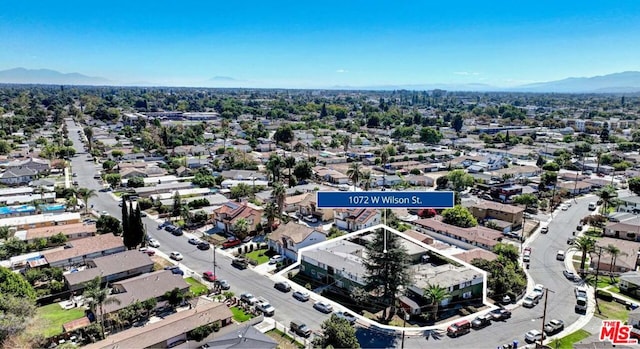 drone / aerial view featuring a mountain view