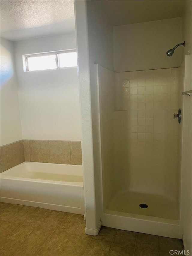 bathroom with independent shower and bath