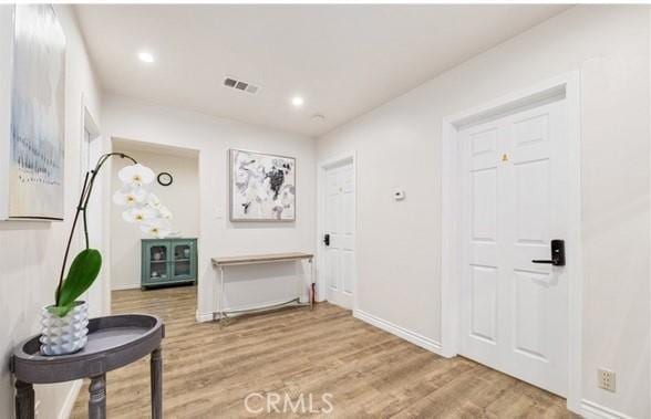 1026 Walnut Grove Ave, Rosemead, CA 91770 - hall featuring baseboards, wood finished floors, and recessed lighting