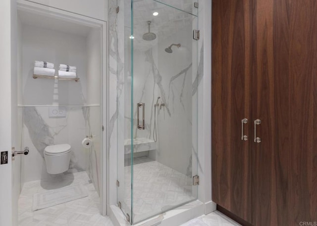 bathroom featuring tile walls, toilet, and an enclosed shower