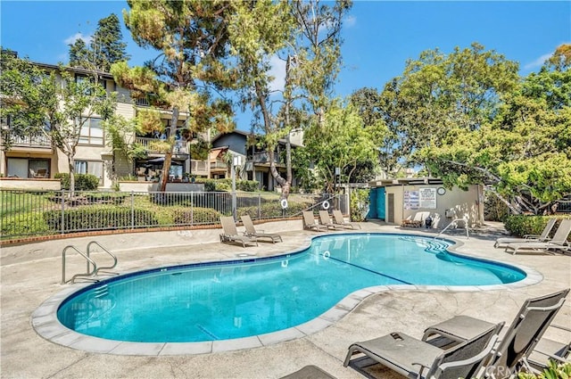 view of pool featuring a patio area