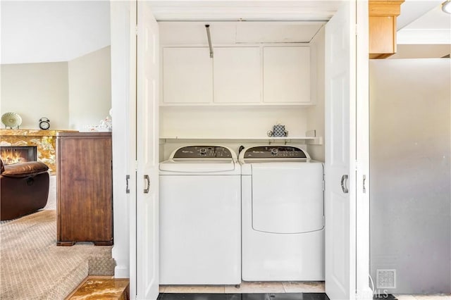 laundry room with separate washer and dryer