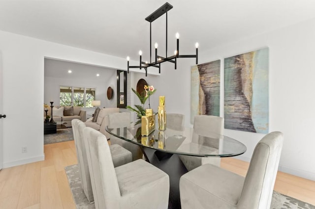 dining space featuring light wood-type flooring