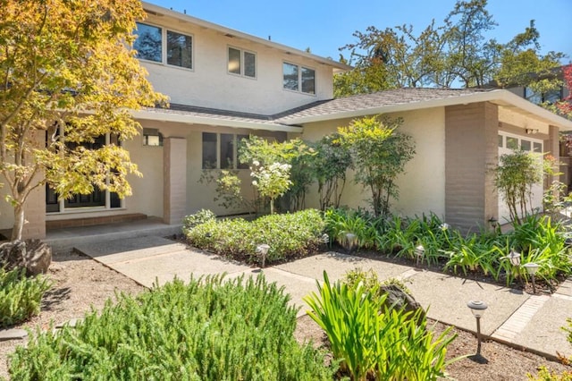 view of front of property featuring a garage