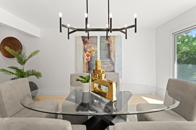 dining space with a chandelier