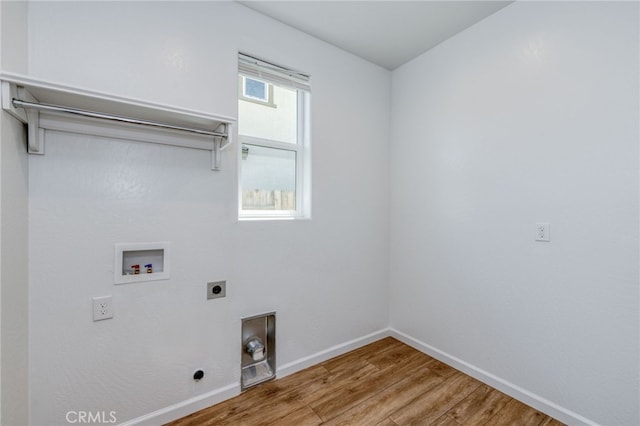 laundry area featuring hookup for a washing machine, hardwood / wood-style flooring, and hookup for an electric dryer