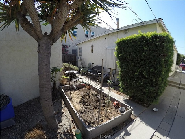 view of yard featuring a patio area and fence