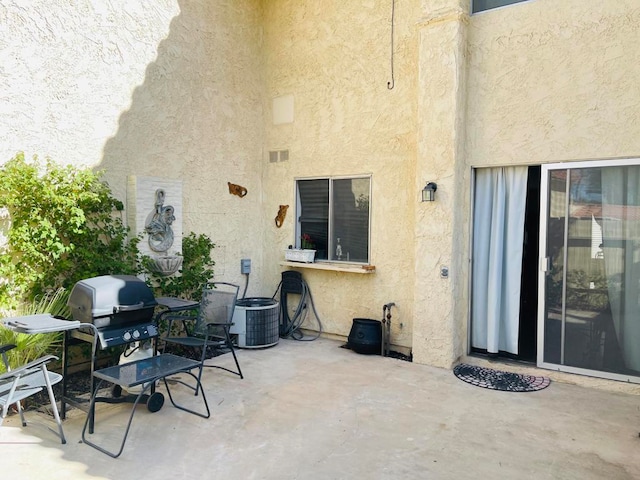 view of patio / terrace featuring a grill