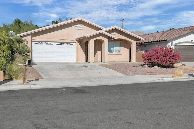 single story home with a garage