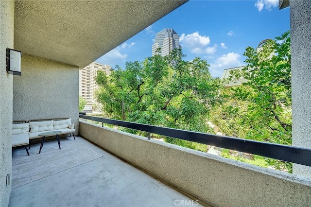 balcony with an outdoor hangout area