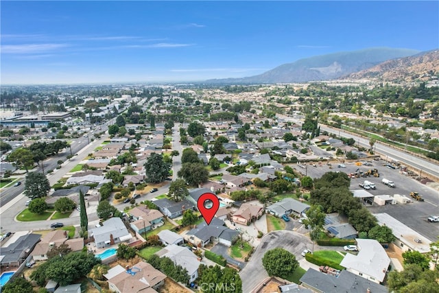 drone / aerial view featuring a mountain view