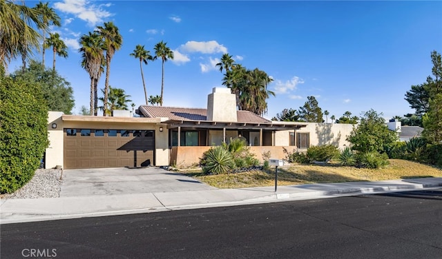 ranch-style house with a garage