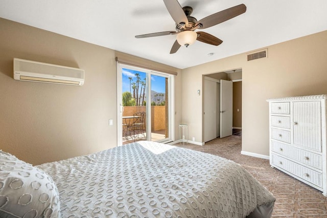 bedroom with light carpet, ceiling fan, access to outside, and a wall mounted AC