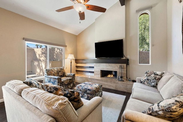 living room with lofted ceiling, hardwood / wood-style floors, and plenty of natural light