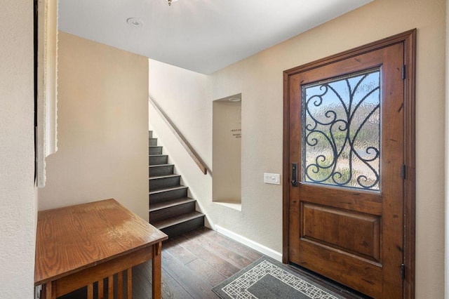 entrance foyer featuring dark wood-type flooring