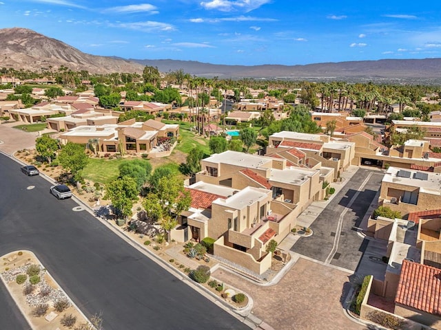 drone / aerial view featuring a mountain view