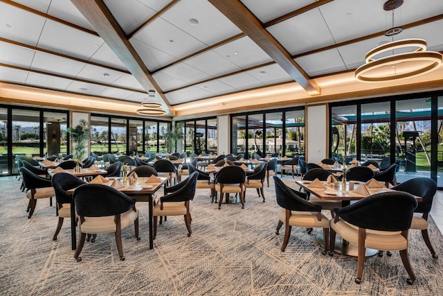 carpeted dining area featuring a wealth of natural light