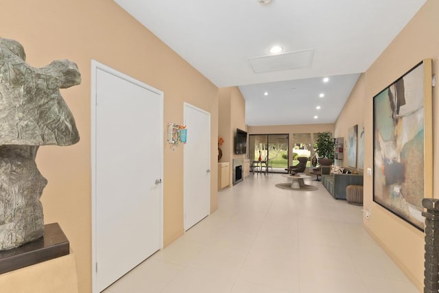 corridor featuring lofted ceiling